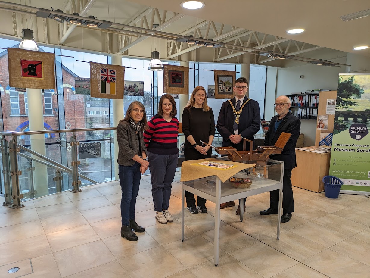 (L-R): Roberta Bacic, CT curator; Sarah Calvin, Museum Services Development Manager; Laura Wright, Museum Officer; Councillor Ciarán McQuillan of Causeway Coast and Glens Borough Council; and Clem McCartney, CT Trustee (Photo: CT Archive)